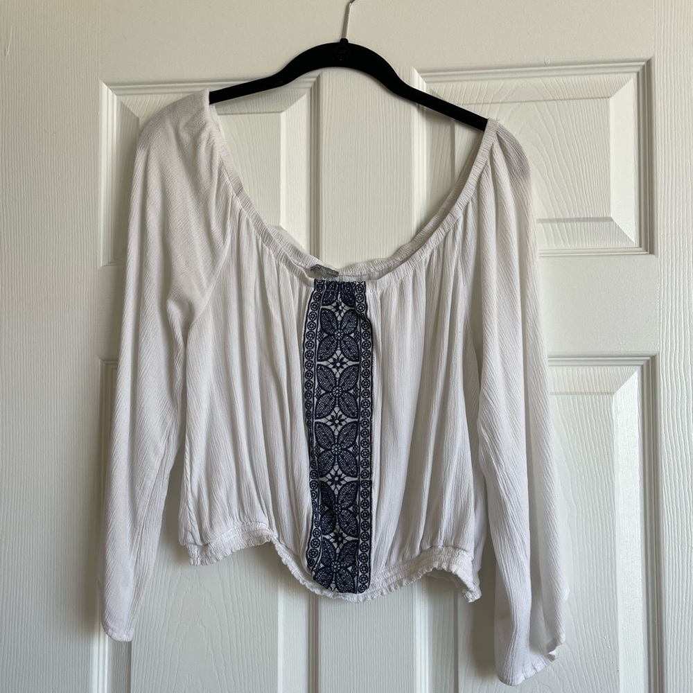 white/blue long sleeve top
